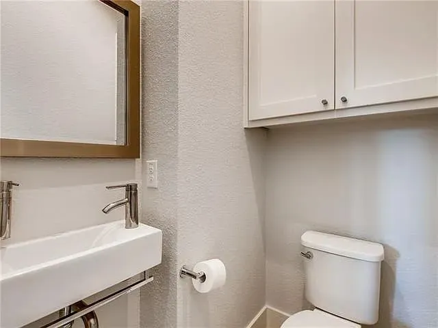 a bathroom with a sink and a toilet