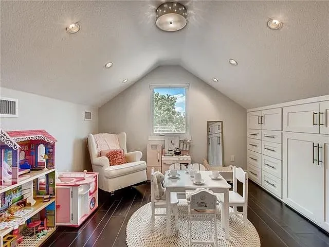 a view of a dining table and chairs