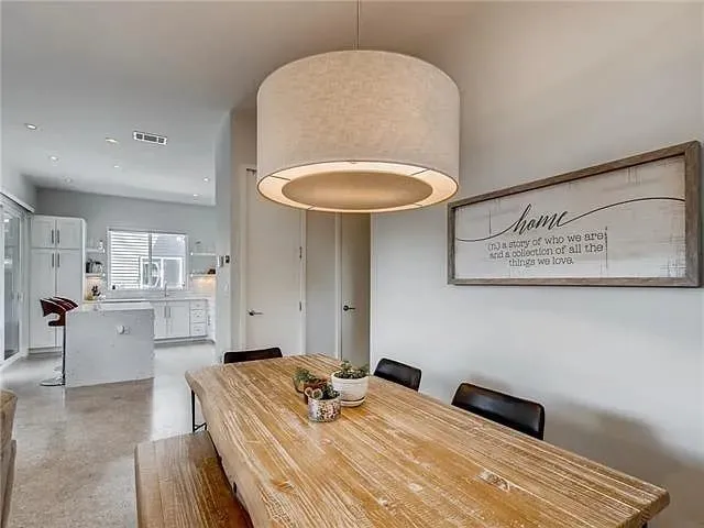 a bedroom with a bed and a mirror