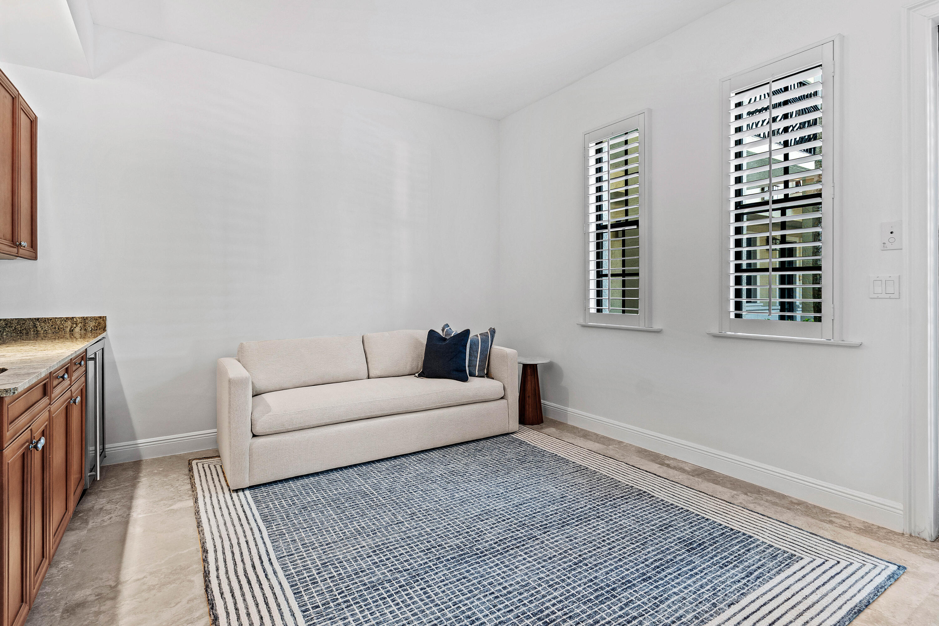 110 Gleason Street, Unit 203 Delray Beach, FL 33483 - Photo 9 of 25 a living room with furniture and a window