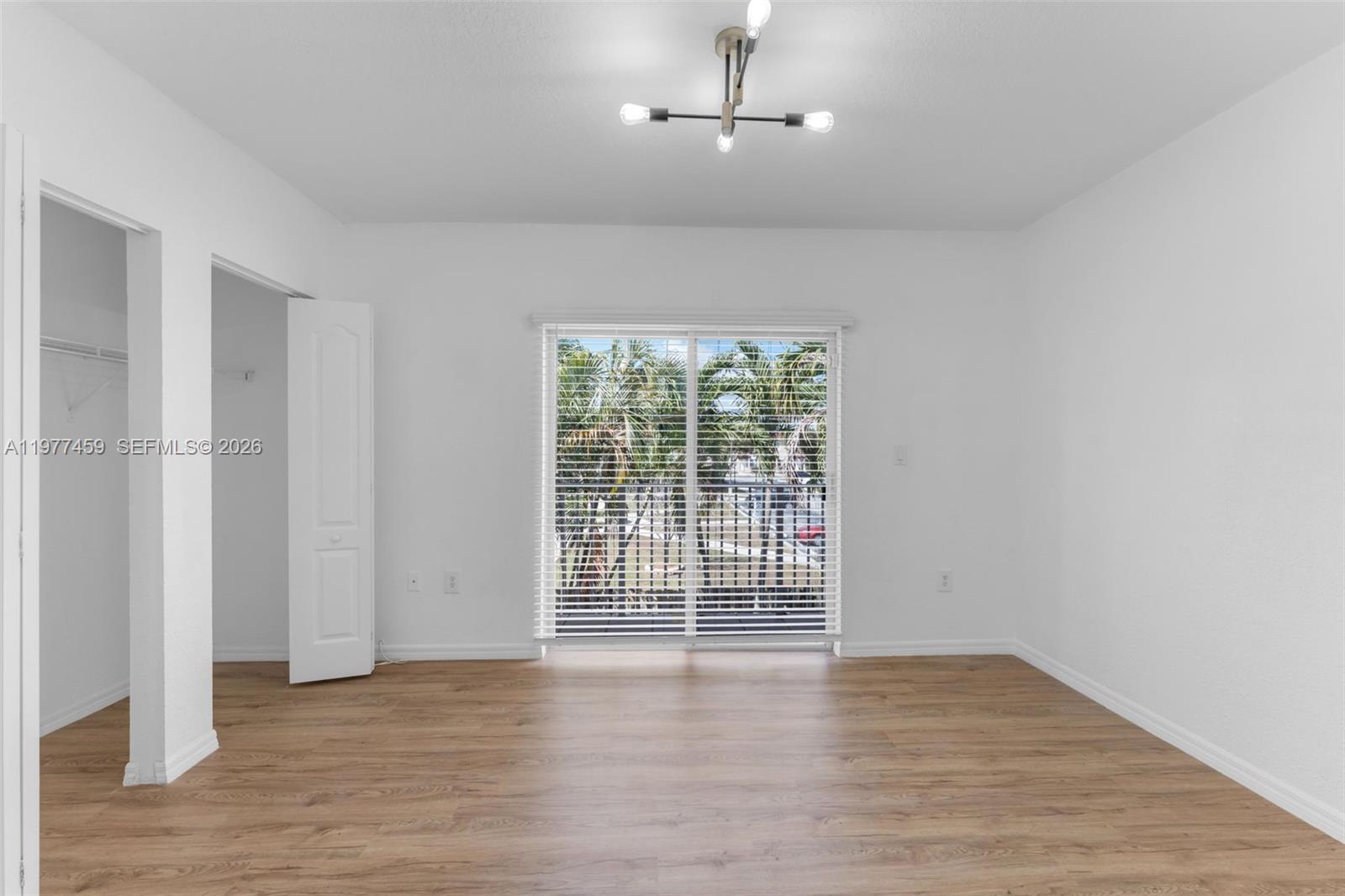17040 Southwest 137th Place Miami, FL 33177 - Photo 16 of 29 a view of a livingroom with wooden floor