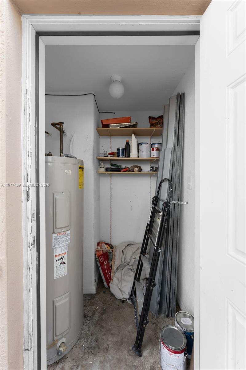 17040 Southwest 137th Place Miami, FL 33177 - Photo 27 of 29 a view of a hallway with closet