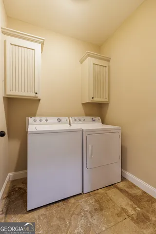 a view of empty room with windows