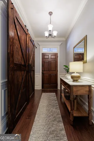 a bathroom with a sink a mirror and a shower