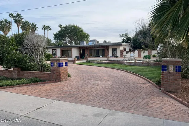 a view of house with outdoor space and trees