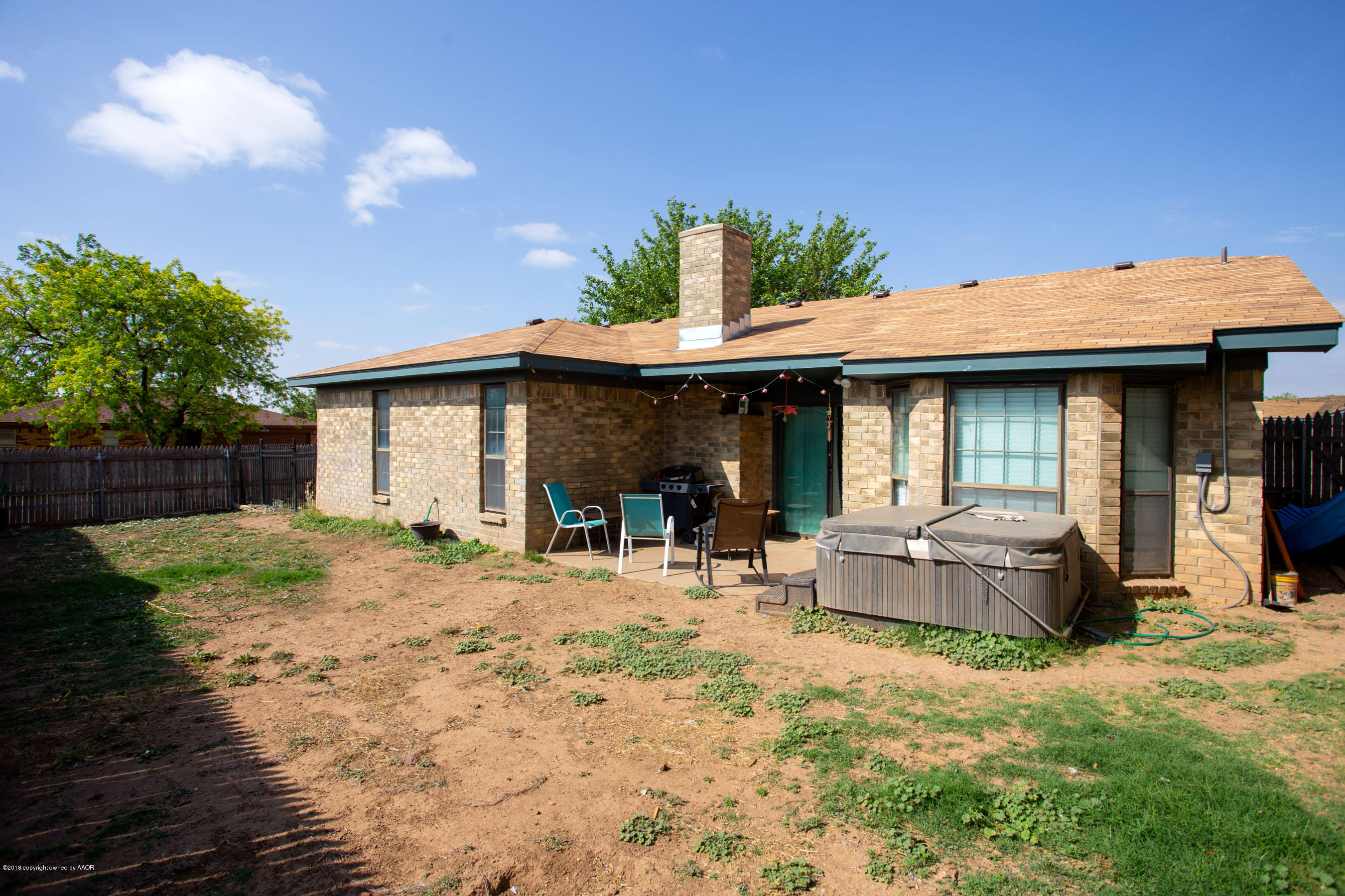 5223 Royce Drive Amarillo, TX 79110 - Photo 24 of 24 Covered patio and hot tub