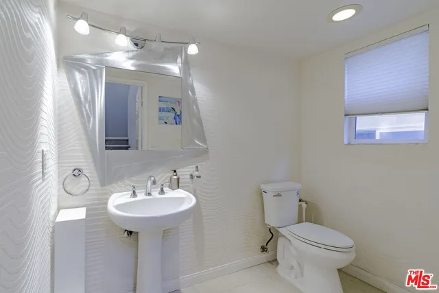 a view of a hallway view with staircase