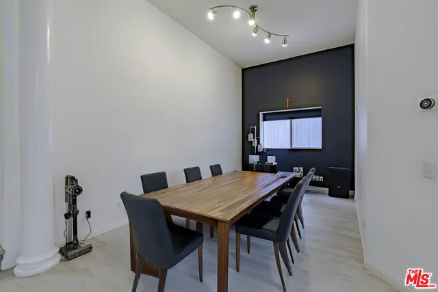a view of entryway with stairs and wooden floor