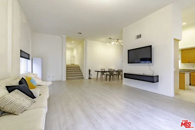 a view of a hallway view with staircase