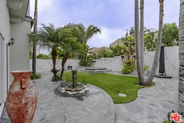 a view of a hallway with toilet