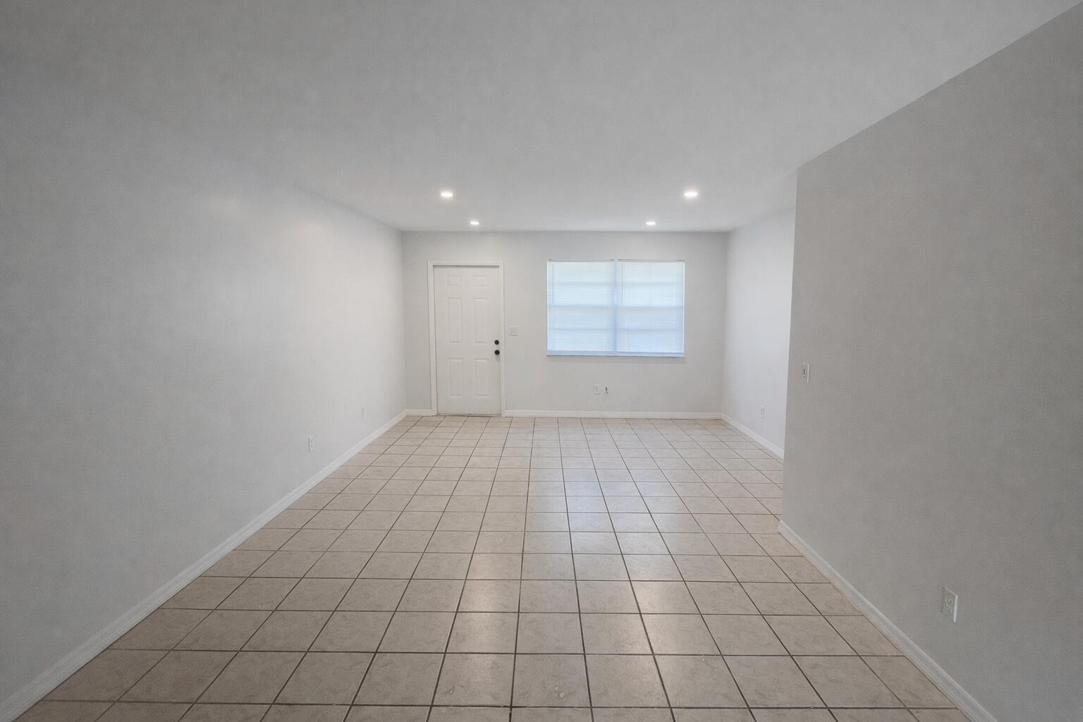 5010 Killarney Avenue, Unit A Fort Pierce, FL 34951 - Photo 5 of 9 5010 A _living & dining room