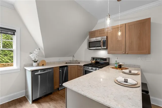 a white toilet sitting next to a bath tub