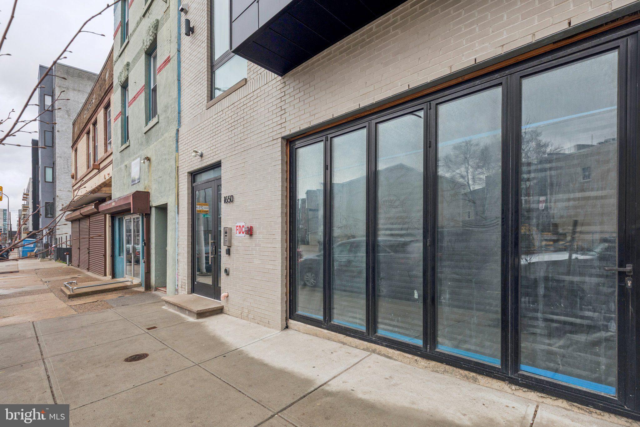 1648-50 Ridge Avenue, Unit 302 Philadelphia, PA 19130 - Photo 34 of 38 a view of a building from the glass door