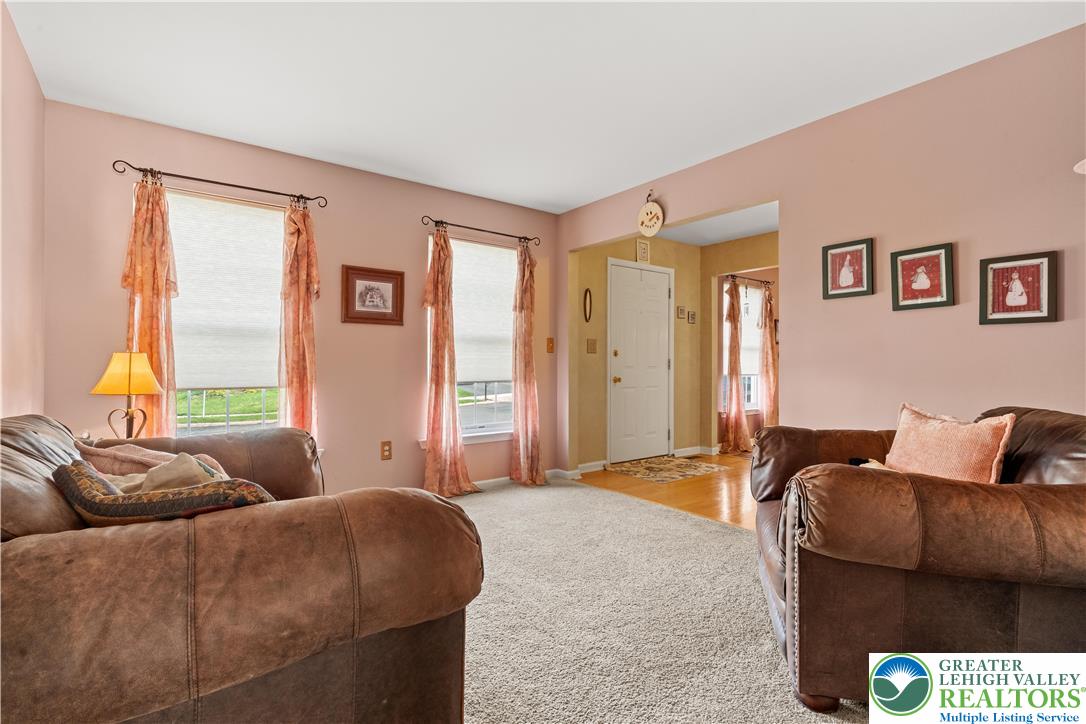 2652 Thistle Road Lower Macungie Township, PA 18062 - Photo 16 of 66 a living room with furniture and a window