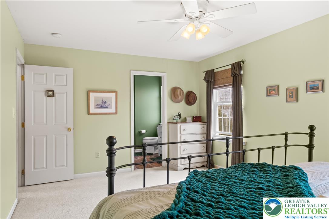 2652 Thistle Road Lower Macungie Township, PA 18062 - Photo 34 of 66 a bedroom with furniture and a window