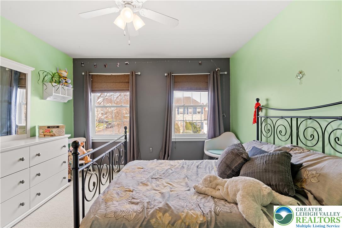 2652 Thistle Road Lower Macungie Township, PA 18062 - Photo 39 of 66 a bedroom with a bed and a table in it