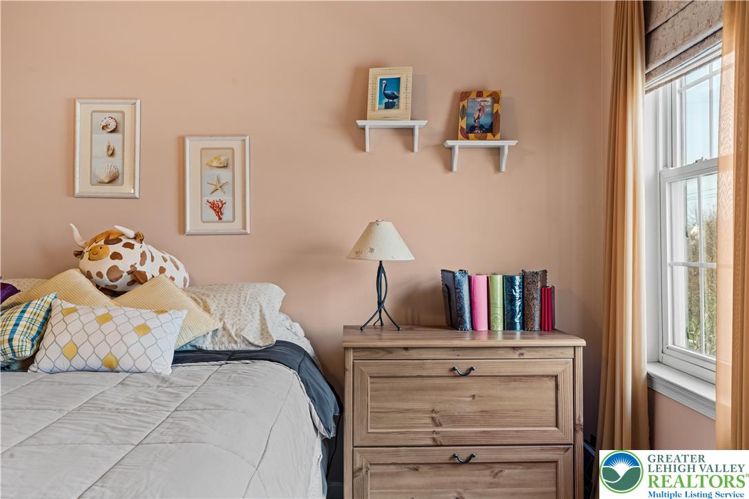 2652 Thistle Road Lower Macungie Township, PA 18062 - Photo 44 of 66 a bedroom with a bed and a window