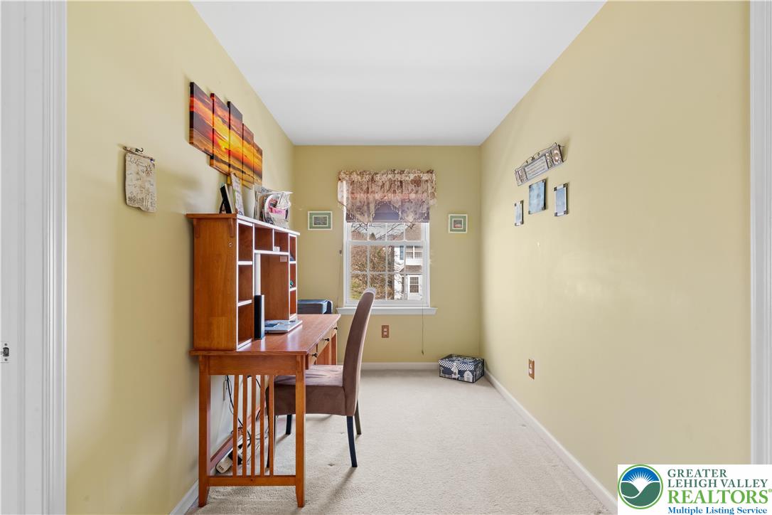 2652 Thistle Road Lower Macungie Township, PA 18062 - Photo 46 of 66 a view of a workspace with furniture and a window