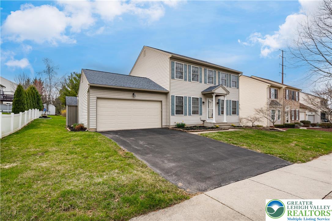 2652 Thistle Road Lower Macungie Township, PA 18062 - Photo 5 of 66 a view of a house with backyard and garden