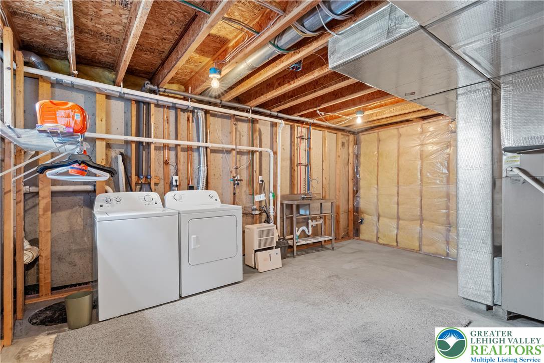 2652 Thistle Road Lower Macungie Township, PA 18062 - Photo 51 of 66 a utility room with dryer and washer