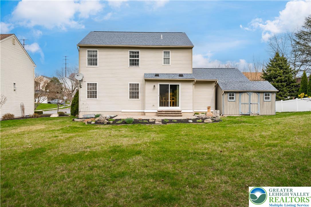 2652 Thistle Road Lower Macungie Township, PA 18062 - Photo 55 of 66 a front view of house with yard and green space
