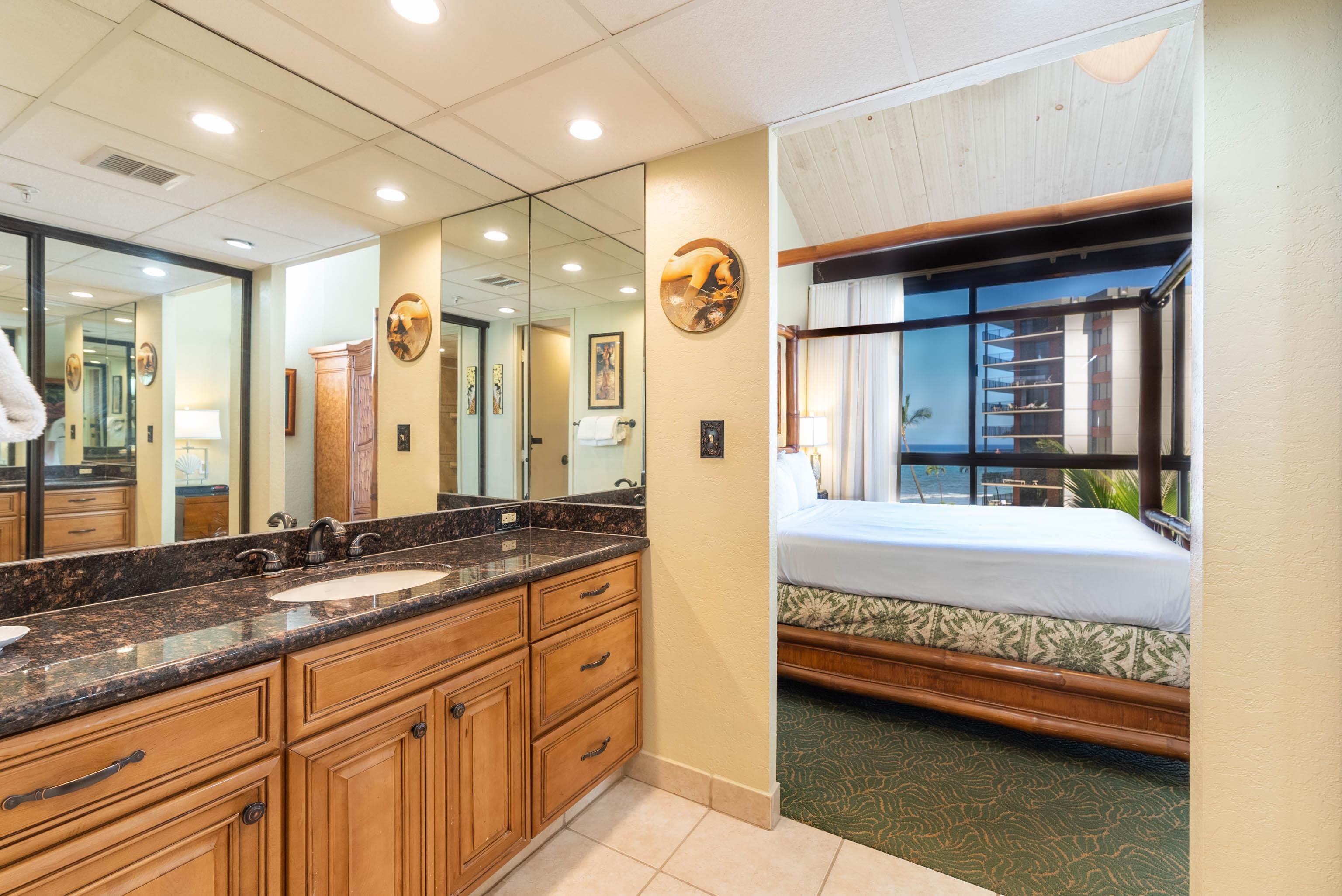 3445 Lower Honoapiilani Road, Unit 456 Lahaina, HI 96761 - Photo 20 of 32 a bathroom with a double vanity sink and a bathtub
