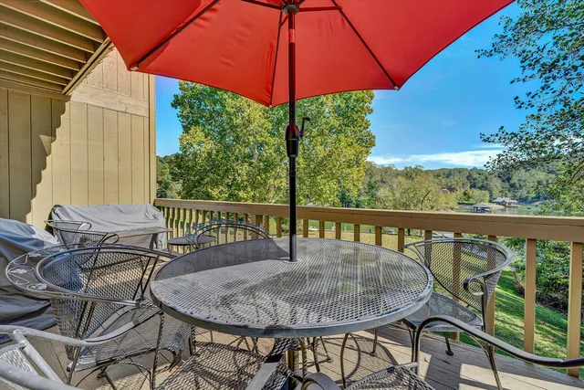 a view of a balcony with furniture