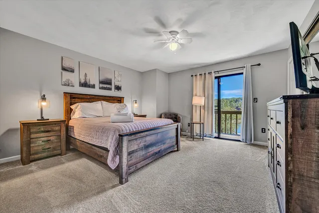 a bedroom with a bed dresser and a window