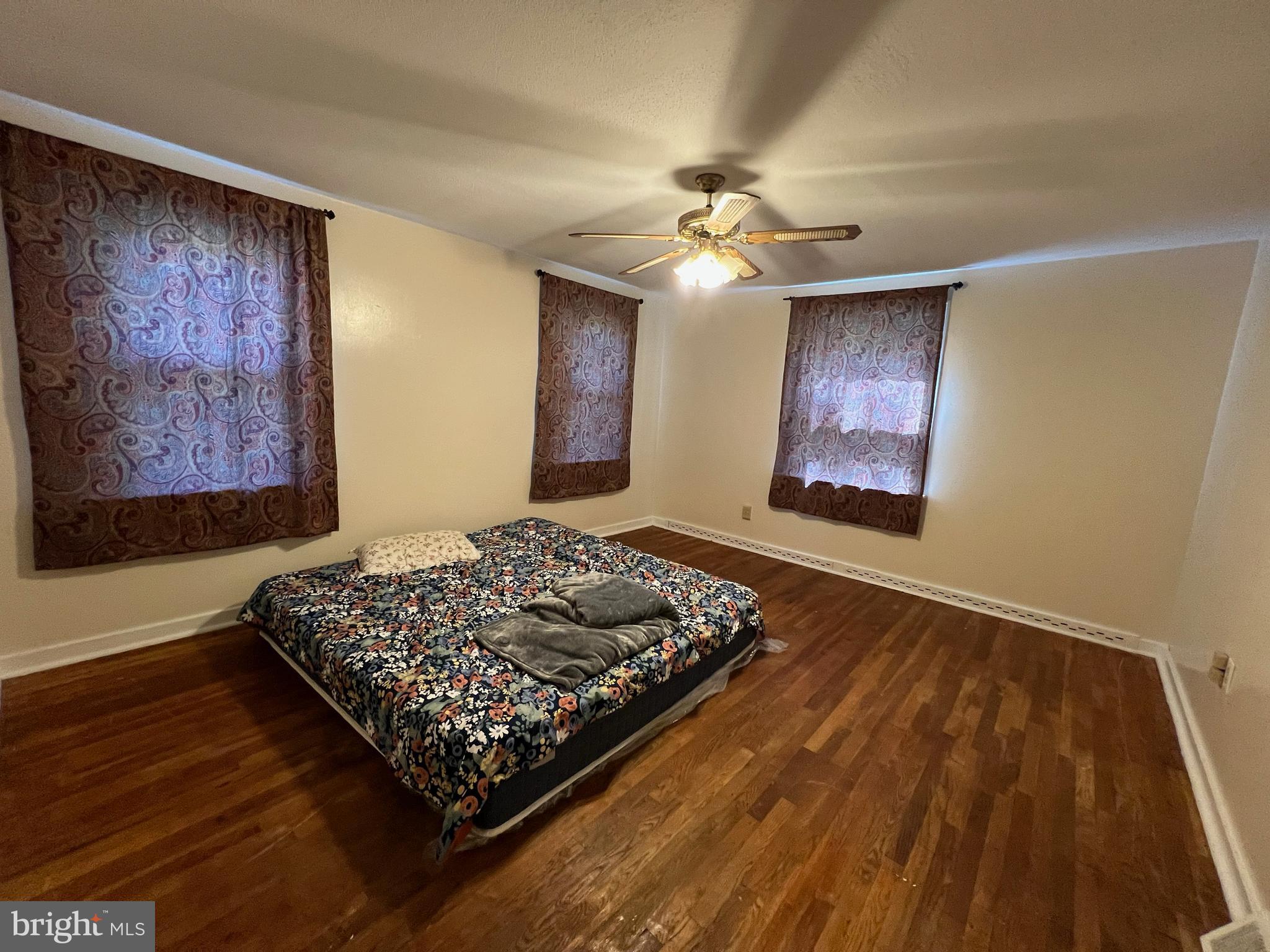132 Conestoga Road Devon, PA 19333 - Photo 4 of 14 a living room with couch and a large window