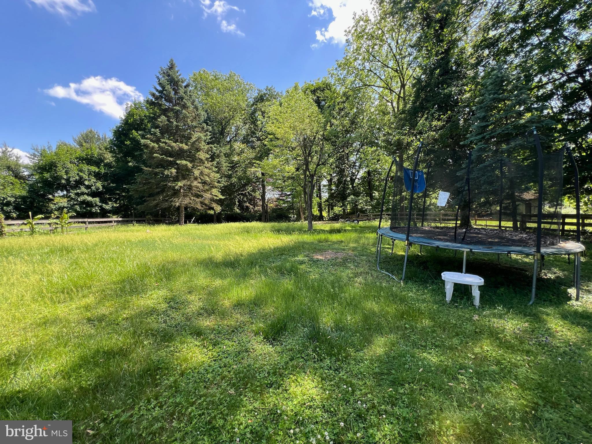 132 Conestoga Road Devon, PA 19333 - Photo 8 of 14 a view of a lake with a house in the background