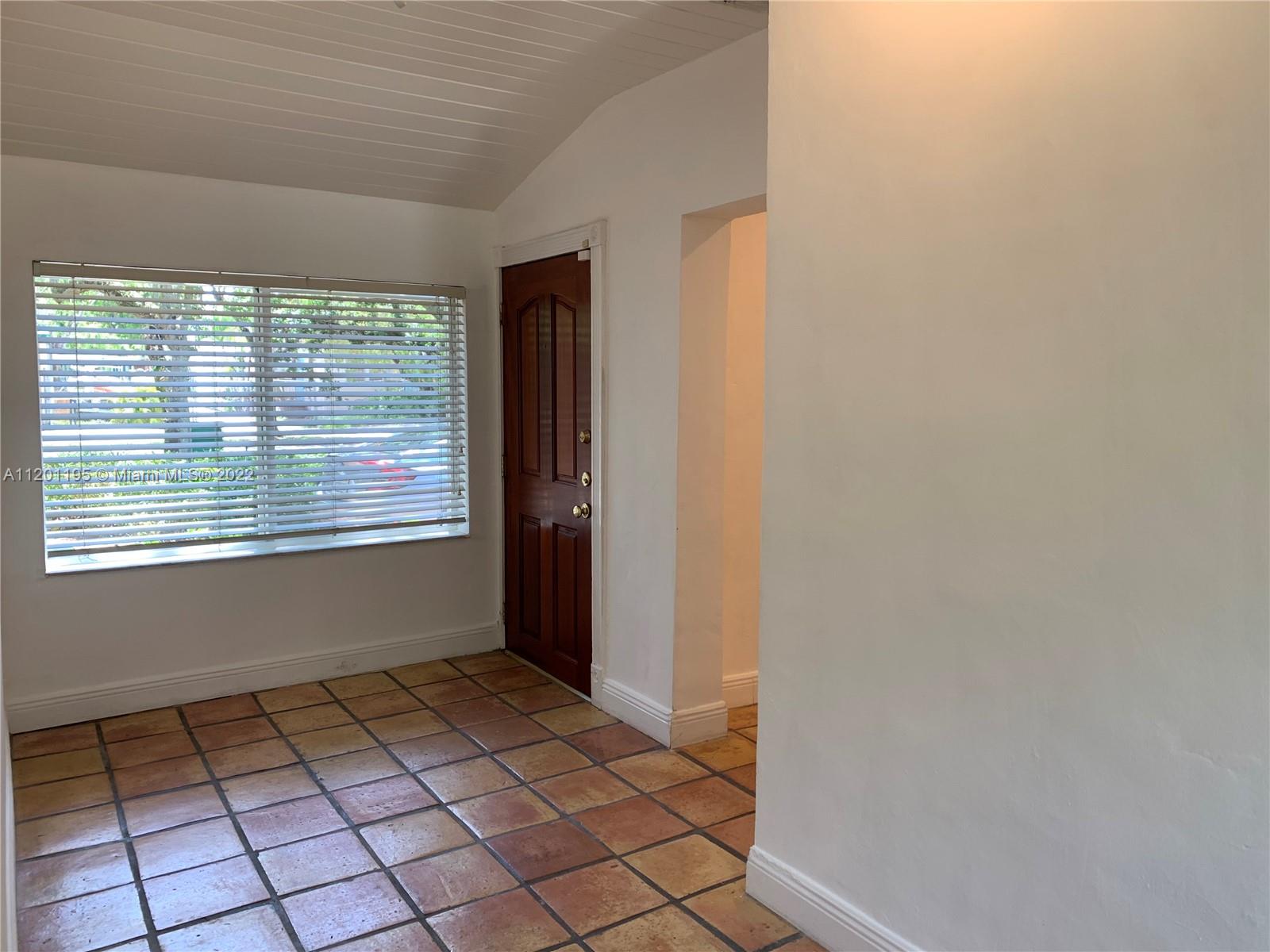 7236 School House Road Miami, FL 33143 - Photo 2 of 25 a view of an empty room and window