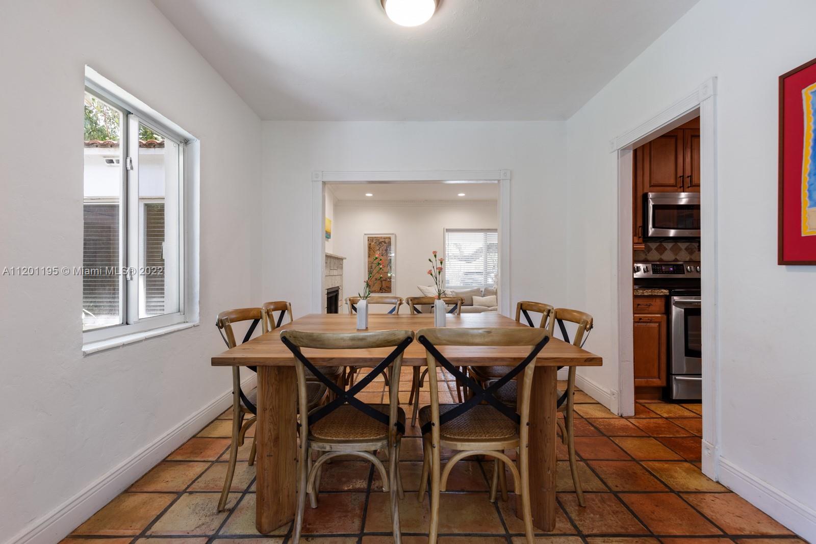 7236 School House Road Miami, FL 33143 - Photo 8 of 25 a view of a dining room with furniture and window