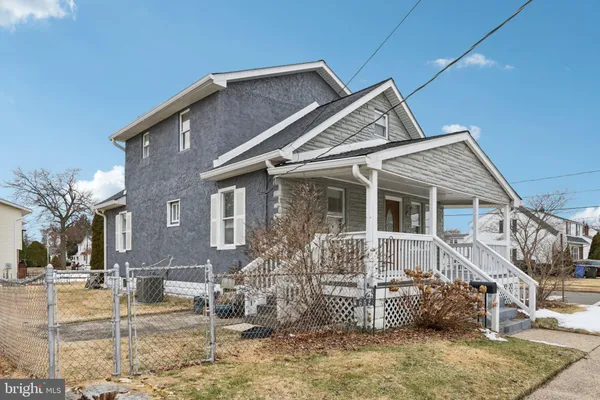 a view of a living room with a large window