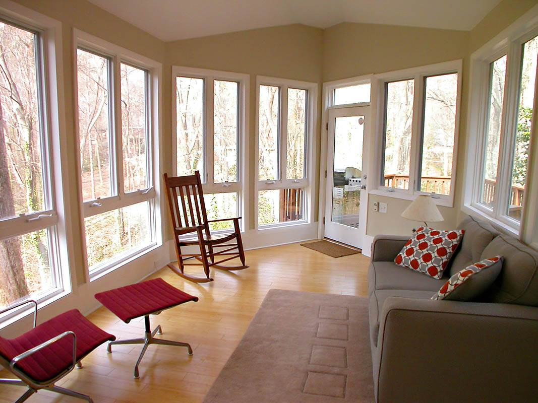 4709 Wedgewood Street Raleigh, NC 27612 - Photo 6 of 25 A seamless synergy of indoors and out, a breath taking haven for owners and guests. Sun Room