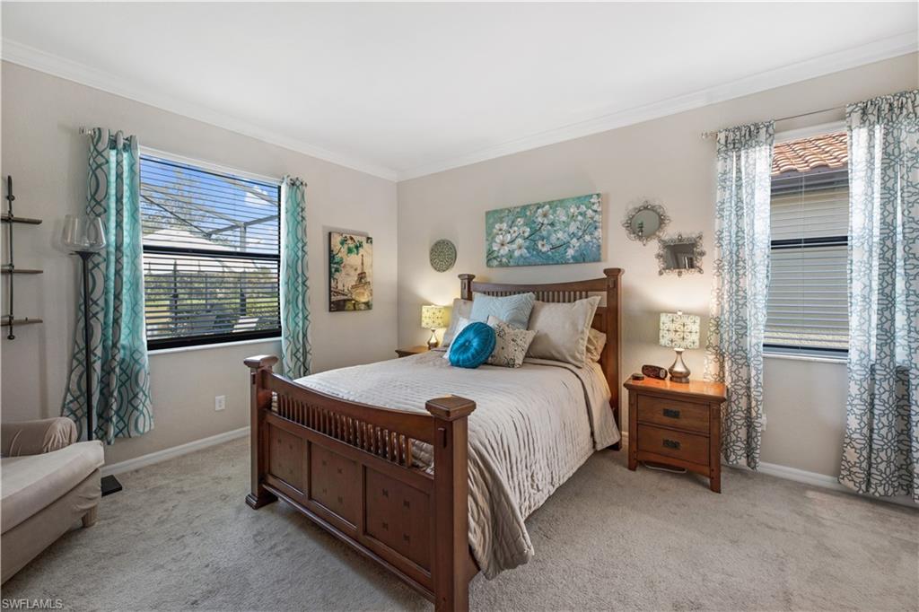 4375 Bismark Way Naples, FL 34119 - Photo 20 of 42 a bedroom with a bed and a window