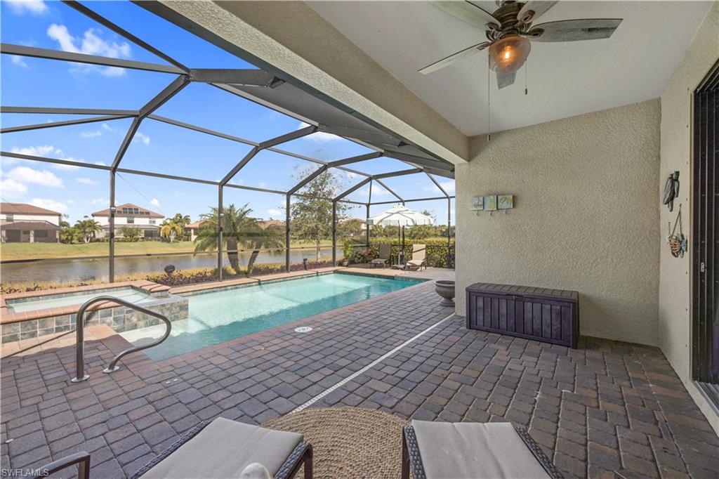 4375 Bismark Way Naples, FL 34119 - Photo 31 of 42 a view of swimming pool with outdoor seating