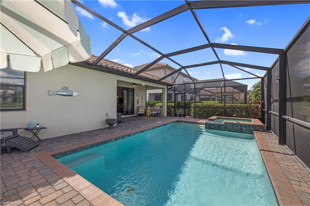 4375 Bismark Way Naples, FL 34119 - Photo 32 of 42 a view of swimming pool with a patio