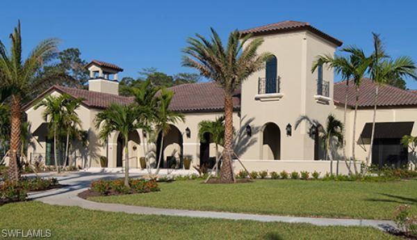 4375 Bismark Way Naples, FL 34119 - Photo 39 of 42 a view of multiple house with backyard and trees