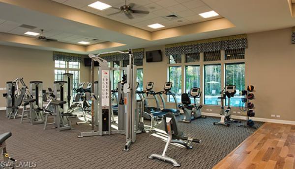 4375 Bismark Way Naples, FL 34119 - Photo 40 of 42 a view of a room with gym equipment