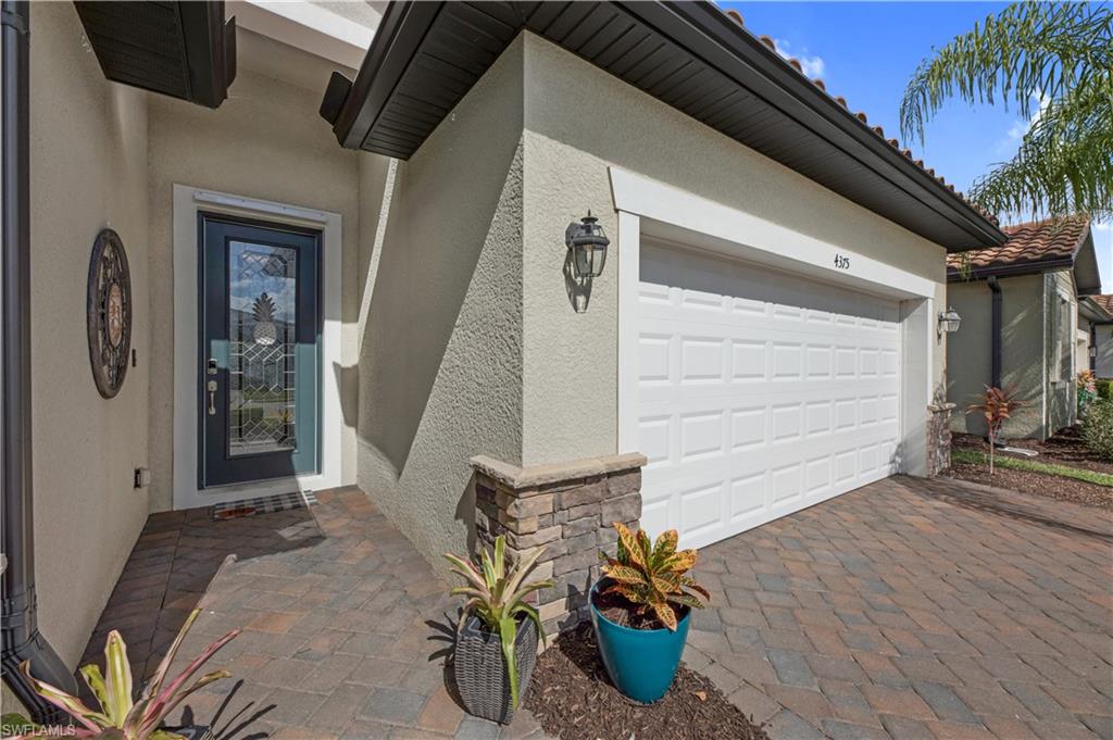 4375 Bismark Way Naples, FL 34119 - Photo 5 of 42 a view of a porch with seating space