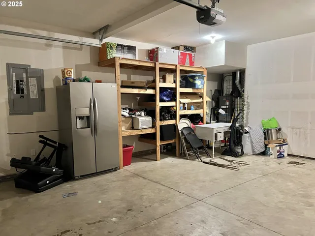 a view of a backyard with iron fence