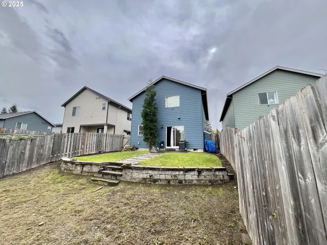 a view of swimming pool with a yard