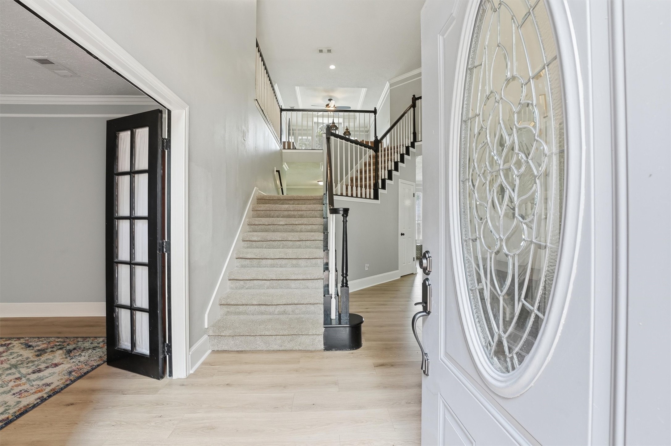 8827 Mile Run Road Humble, TX 77346 - Photo 4 of 37 a view of a entryway with wooden floor