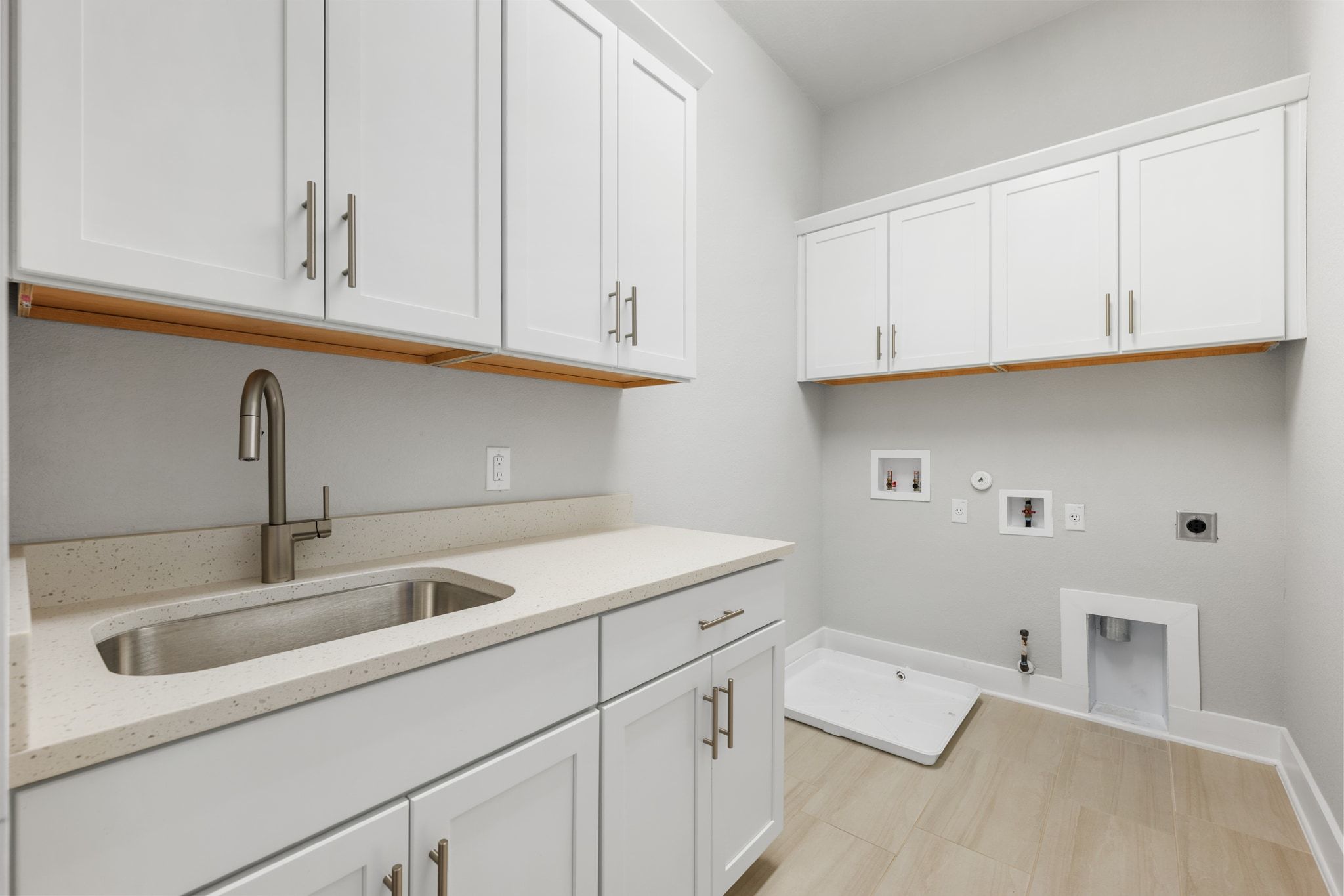4323 Spicewood Springs Road, Unit 9 Austin, TX 78759 - Photo 28 of 31 Dedicated utility room with cabinetry and sink