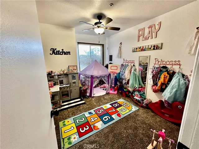 a view of a kids room with toys