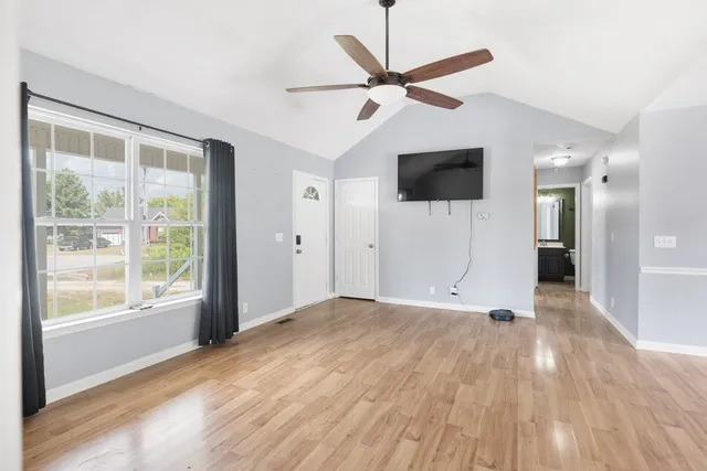 a view of a livingroom with a flat screen tv