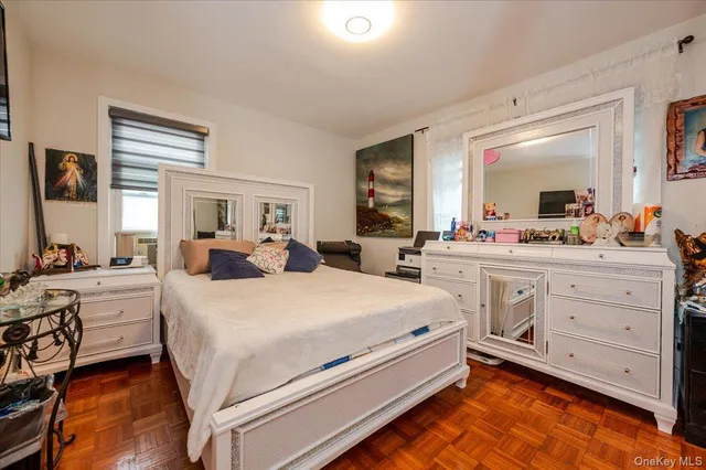 a bed room with bed and window