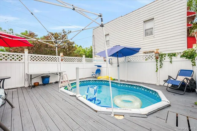 a view of a dinning table and chair in the balcony