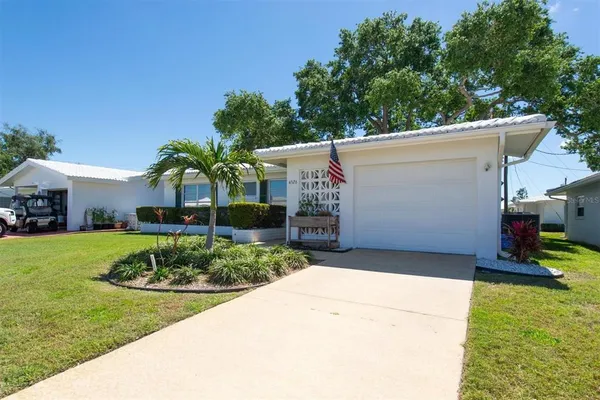 a view of a back yard of the house