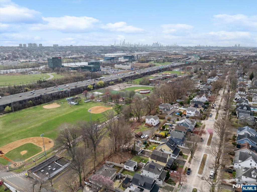 119 Overpeck Avenue Ridgefield Park, NJ 07660 - Photo 37 of 44 an aerial view of a city with mountains